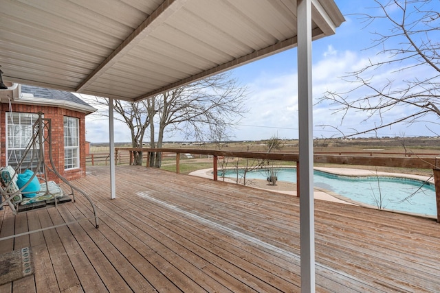 deck featuring an outdoor pool