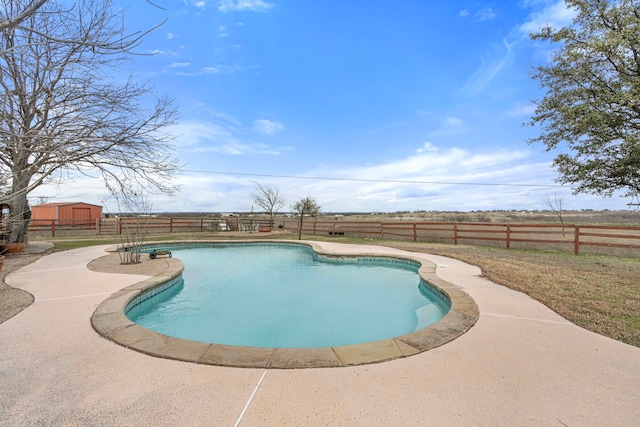 view of swimming pool with a fenced in pool and a fenced backyard