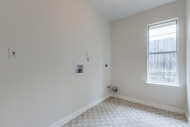 clothes washing area with washer hookup, laundry area, a wealth of natural light, and gas dryer hookup