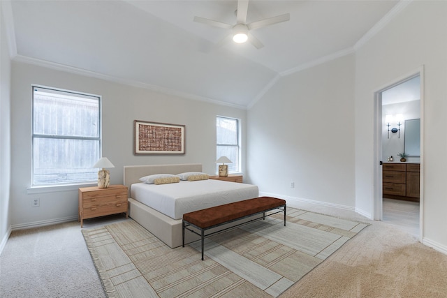 bedroom featuring baseboards, crown molding, lofted ceiling, and carpet floors