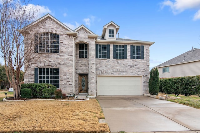 view of front of property featuring brick siding, concrete driveway, and an attached garage