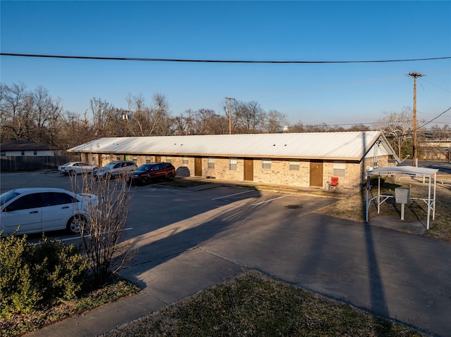 view of front of home with uncovered parking