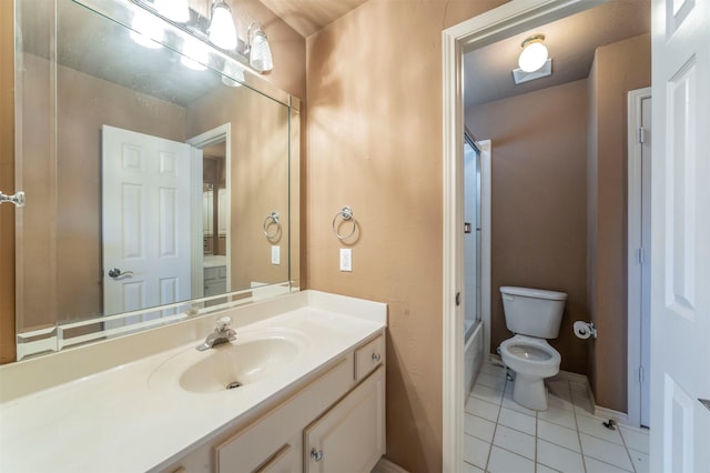 bathroom with vanity, tile patterned floors, toilet, and  shower combination