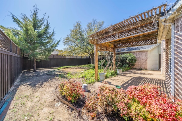 view of yard with a fenced backyard and a patio area