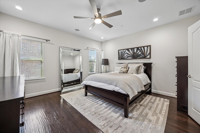 7917 Parkwood Blvd, Plano, TX 75024 - bedroom featuring dark wood-type flooring, baseboards, recessed lighting, and a ceiling fan