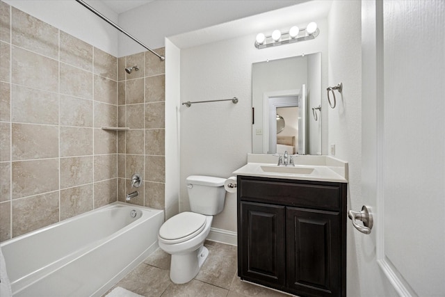 7917 Parkwood Blvd, Plano, TX 75024 - bathroom featuring toilet, tile patterned flooring, vanity, and shower / washtub combination