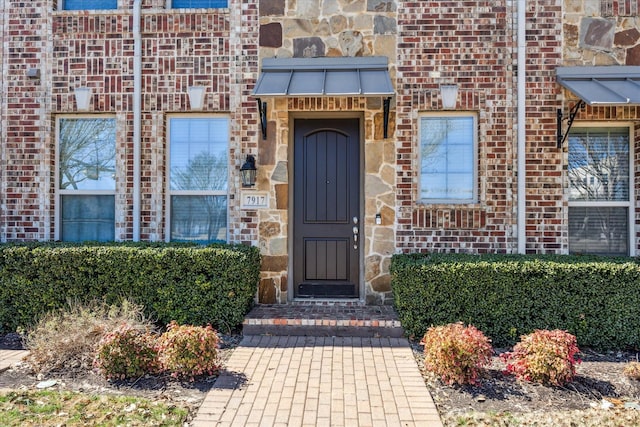 7917 Parkwood Blvd, Plano, TX 75024 - entrance to property with brick siding and stone siding