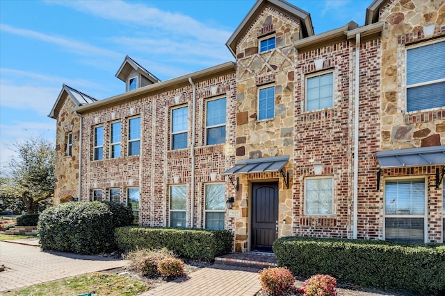 7917 Parkwood Blvd, Plano, TX 75024 - view of front facade featuring brick siding