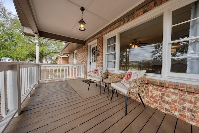 wooden terrace featuring covered porch