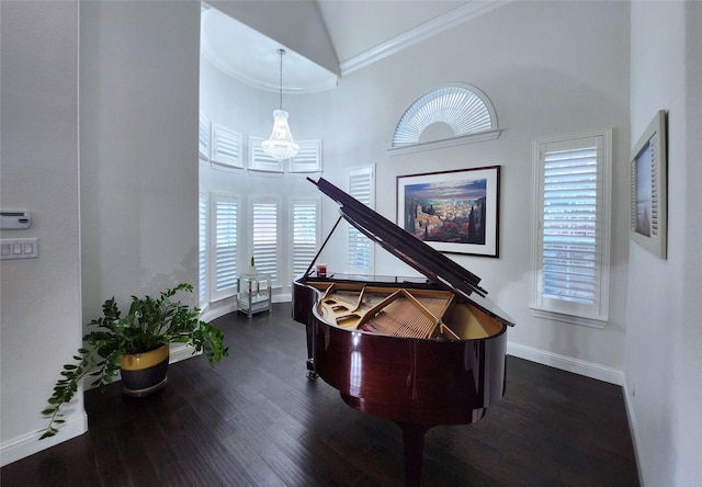 living area featuring dark wood finished floors, high vaulted ceiling, baseboards, and ornamental molding