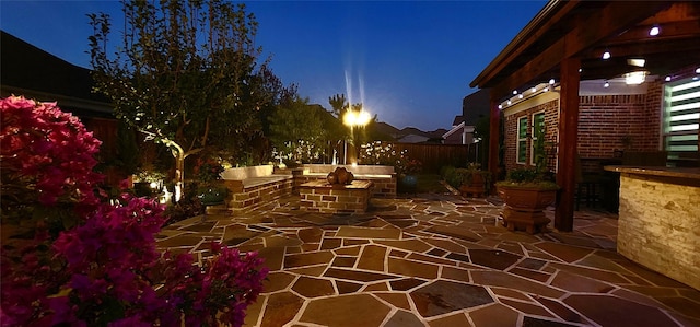 view of patio at night