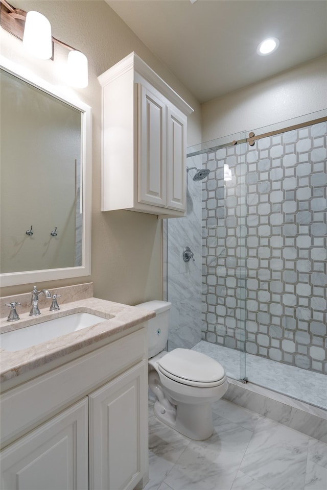 full bathroom with toilet, marble finish floor, recessed lighting, a shower stall, and vanity