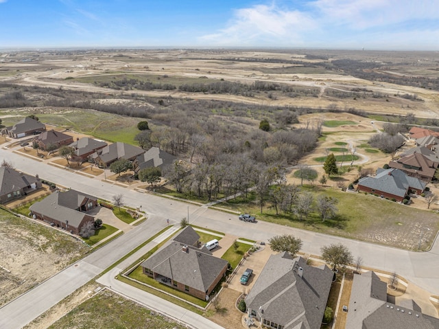 birds eye view of property with a residential view