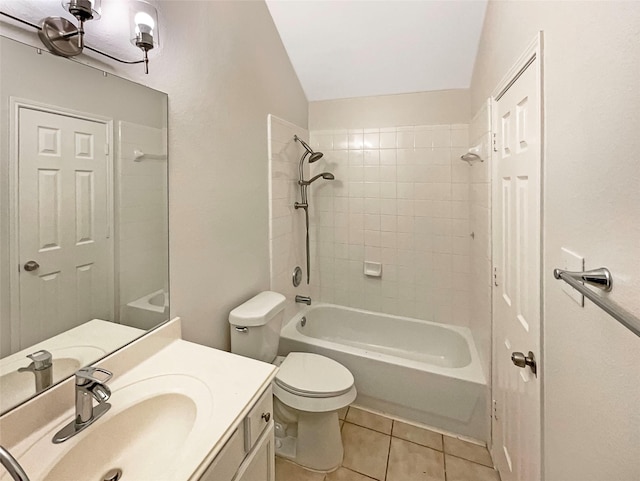 bathroom with tile patterned floors, toilet, shower / washtub combination, and vanity