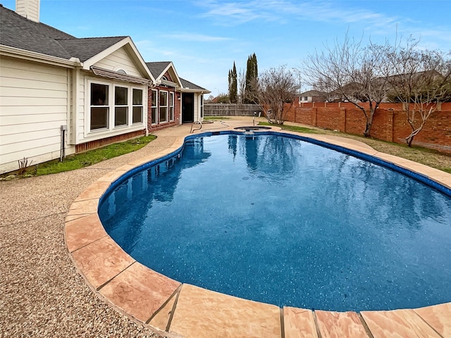 view of pool with a patio, a fenced backyard, and a fenced in pool