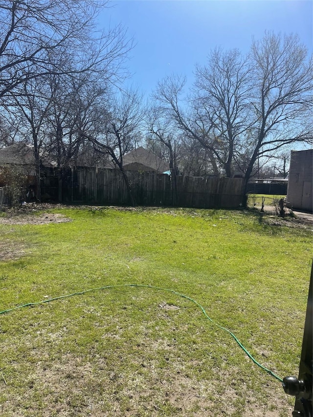 view of yard with fence