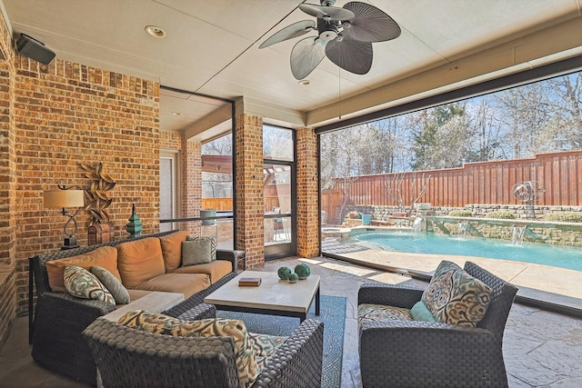 7300 Mitchell Ct, Lantana, TX 76226 - fenced backyard featuring an outdoor living space, a ceiling fan, and a patio