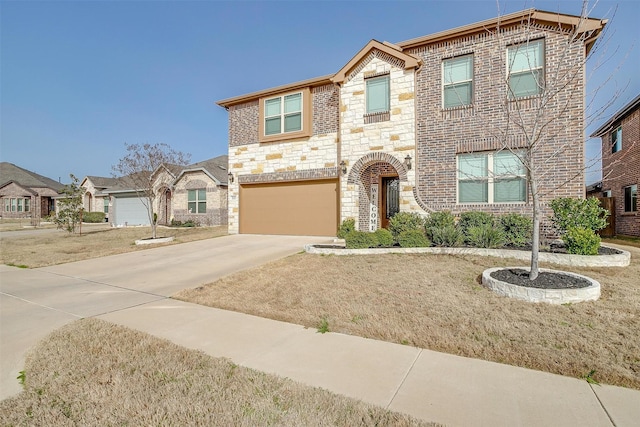 view of front of house featuring brick siding, stone siding, concrete driveway, and a garage