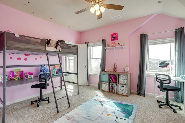 bedroom featuring visible vents, carpet flooring, baseboards, and vaulted ceiling