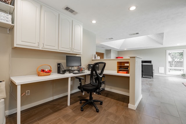 office area featuring recessed lighting, visible vents, and built in study area