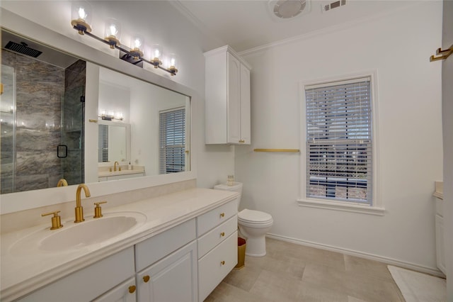 full bath with visible vents, ornamental molding, a shower stall, baseboards, and vanity