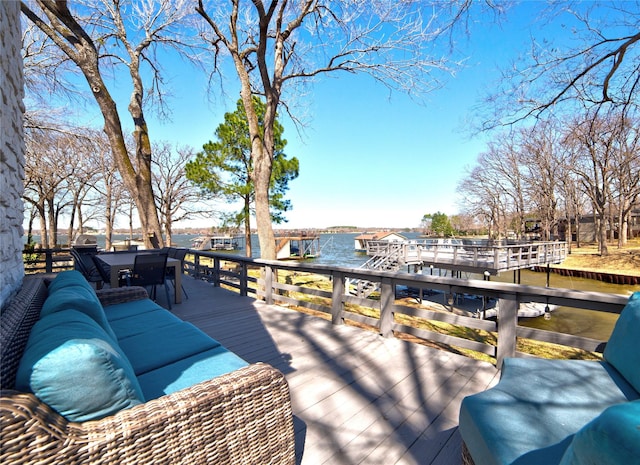 deck featuring a water view