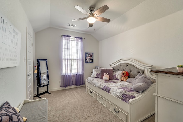 bedroom with visible vents, light carpet, baseboards, ceiling fan, and vaulted ceiling