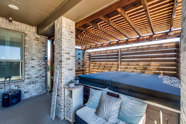 view of patio with a pergola and a hot tub