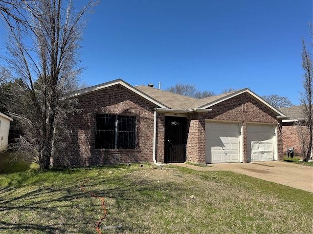 single story home with brick siding, a front yard, an attached garage, and driveway