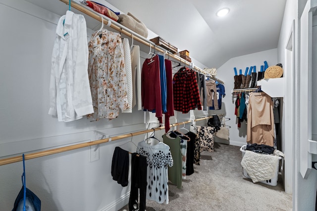 623 Woodridge Dr, Oak Point, TX 75068 - walk in closet featuring carpet floors and vaulted ceiling