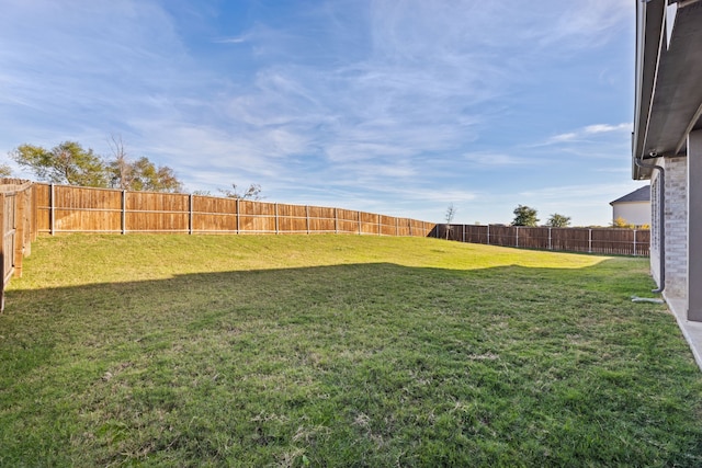 view of yard featuring a fenced backyard