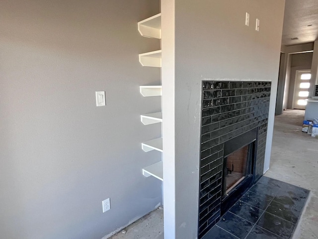 interior details with a fireplace