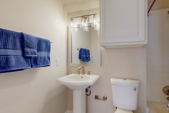 full bath featuring tub / shower combination and toilet