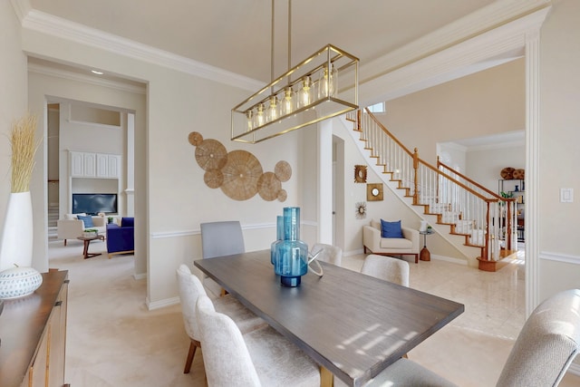 dining space featuring stairway, baseboards, and ornamental molding