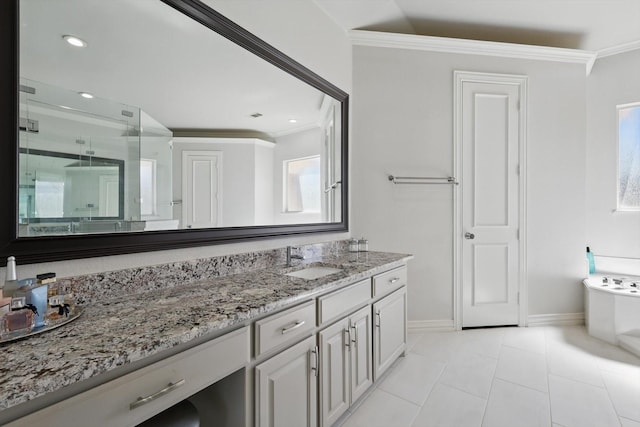 full bathroom with a tub to relax in, a stall shower, ornamental molding, baseboards, and vanity