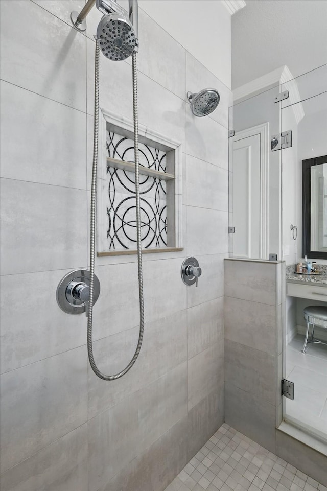 bathroom with tiled shower