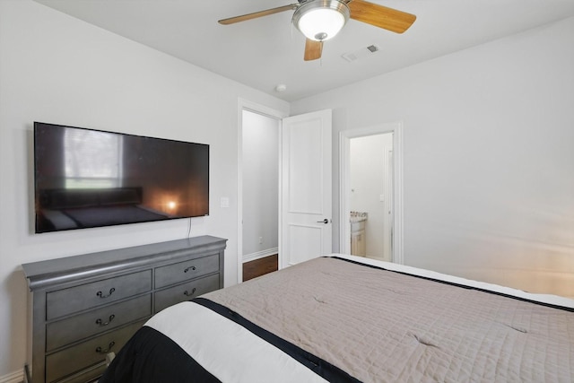 5833 Forest River Dr, Fort Worth, TX 76112 - bedroom featuring carpet flooring, baseboards, visible vents, and ensuite bath