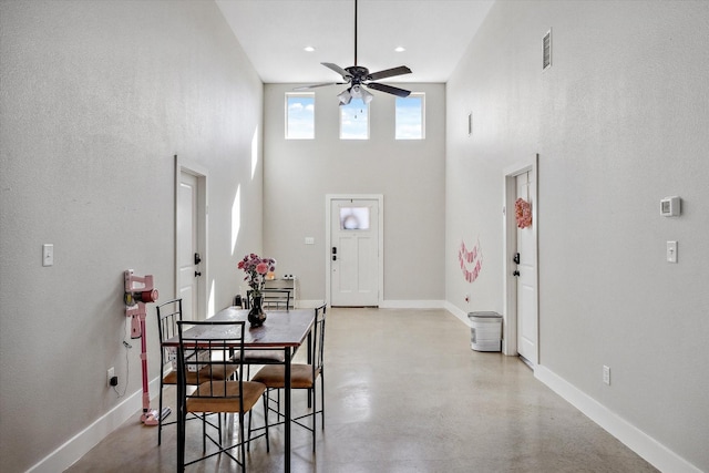 dining room featuring visible vents, baseboards, recessed lighting, ceiling fan, and concrete flooring