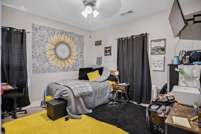 bedroom featuring visible vents and carpet