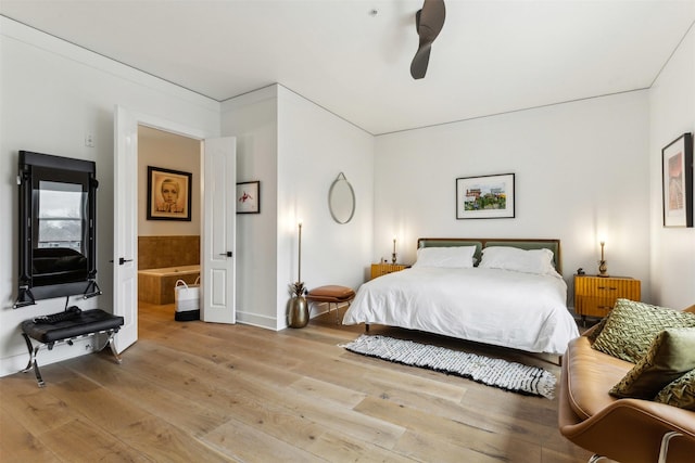 bedroom featuring light wood-type flooring and ceiling fan