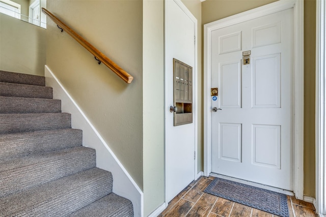 interior space featuring stairway and wood tiled floor