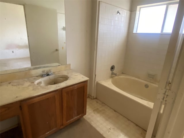 full bath with tile patterned floors, shower / bathtub combination, and vanity