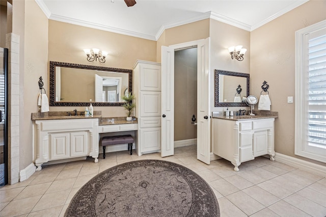 full bathroom with a sink, baseboards, tile patterned flooring, and ornamental molding