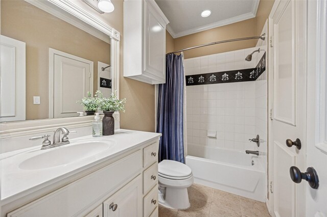 full bathroom featuring tile patterned flooring, toilet, ornamental molding, shower / bath combo, and vanity