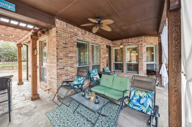 view of patio featuring outdoor lounge area and a ceiling fan