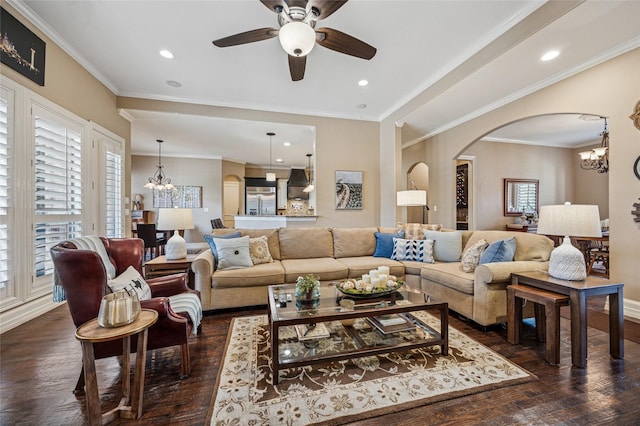 living room featuring arched walkways, recessed lighting, ornamental molding, and dark wood-style flooring