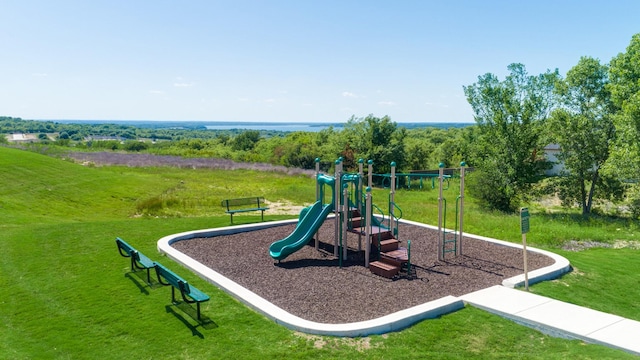 community play area with a lawn