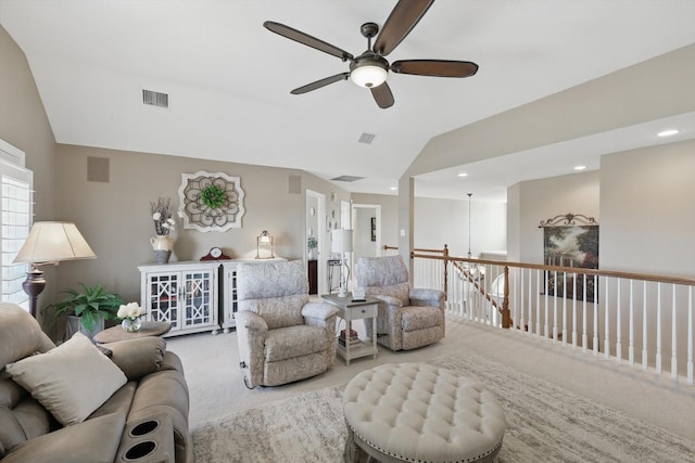 living area featuring recessed lighting, visible vents, lofted ceiling, and carpet flooring