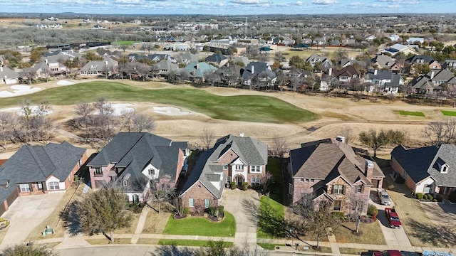 bird's eye view with a residential view and view of golf course