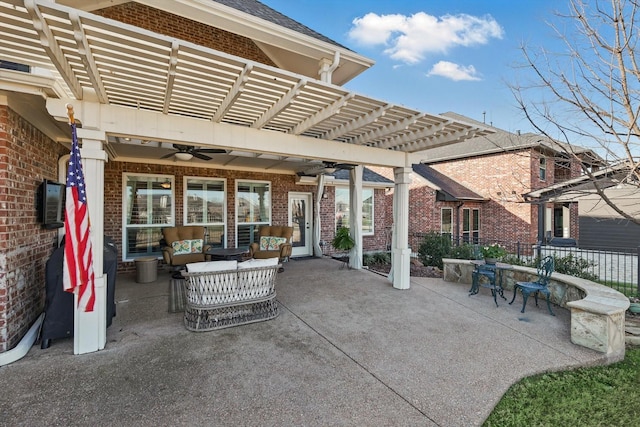 view of patio featuring ceiling fan and a pergola